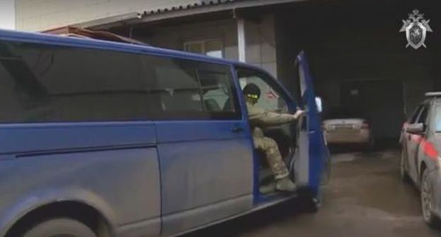 Law enforcers' car. Screenshot of the video by the Investigative Committee of the Russian Federation https://yandex.ru/search/? Law enforcers' car. Screenshot of the video by the Investigative Committee of the Russian Federation https://yandex.ru/search/?