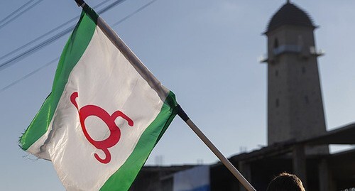 A flag held by a participant of the rally in Magas, October 2018. Photo: REUTERS/Maxim Shemetov A flag held by a participant of the rally in Magas, October 2018. Photo: REUTERS/Maxim Shemetov