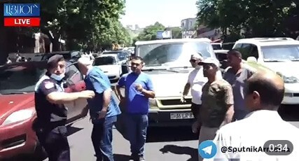 Members of the families of soldiers, missing in action during the autumn war in Nagorno-Karabakh, have blocked Geratsi Street in Yerevan. Screenshot of the video by the "Sputnik Armenia" https://ru.armeniasputnik.am/society/20210531/27747192/Bolee-200-tel-tayno-khranilos-v-kholodilnikakh-rodnye-voennykh-perekryli-ulitsu-v-Erevane.html Members of the families of soldiers, missing in action during the autumn war in Nagorno-Karabakh, have blocked Geratsi Street in Yerevan. Screenshot of the video by the "Sputnik Armenia" https://ru.armeniasputnik.am/society/20210531/27747192/Bolee-200-tel-tayno-khranilos-v-kholodilnikakh-rodnye-voennykh-perekryli-ulitsu-v-Erevane.html