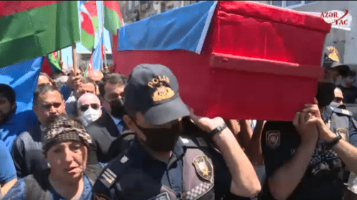 The funeral of the journalist Magerram Ibragimov in Azerbaijan, June 5, 2021. Screenshot of the video https://video.azertag.az/ru/site/video/118887 The funeral of the journalist Magerram Ibragimov in Azerbaijan, June 5, 2021. Screenshot of the video https://video.azertag.az/ru/site/video/118887