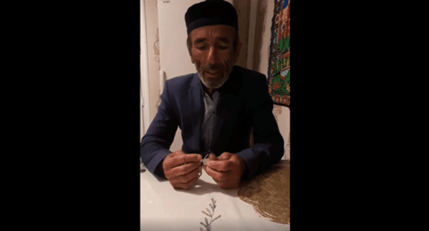 Akhmetkhan Timurziev. Still picture from his appeal to Ramzan Kadyrov, t.me/fortangaorg/9162 Akhmetkhan Timurziev. Still picture from his appeal to Ramzan Kadyrov, t.me/fortangaorg/9162