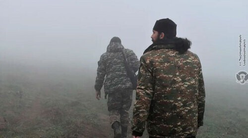 A priest and a soldier of the Armenian army. Photo by the press service of the country's Ministry of Defence A priest and a soldier of the Armenian army. Photo by the press service of the country's Ministry of Defence