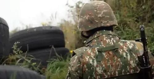 An Armenian soldier at a combat post. Screenshot of video posted by the Ministry of Defence of Armenia, http://mil.am/hy/news/9921 An Armenian soldier at a combat post. Screenshot of video posted by the Ministry of Defence of Armenia, http://mil.am/hy/news/9921