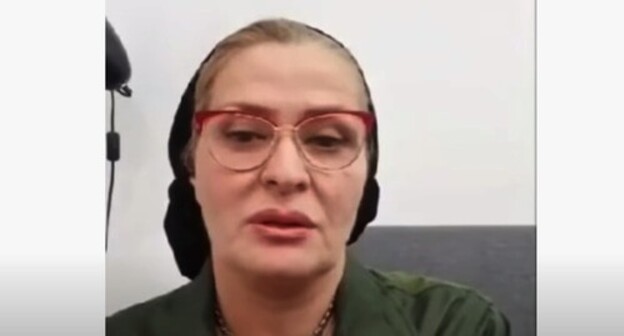 Rubati Mitsaeva. Screenshot of the video by MUHAMMAD 95 https://www.youtube.com/watch?v=qfJsZJtXs20 Rubati Mitsaeva. Screenshot of the video by MUHAMMAD 95 https://www.youtube.com/watch?v=qfJsZJtXs20