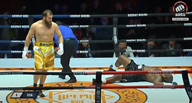 A fragment of the fight of Abdulkerim Edilov against Richard Larti. Screenshot of the video by Match TV https://www.youtube.com/watch?v=symn20aXJt4 A fragment of the fight of Abdulkerim Edilov against Richard Larti. Screenshot of the video by Match TV https://www.youtube.com/watch?v=symn20aXJt4