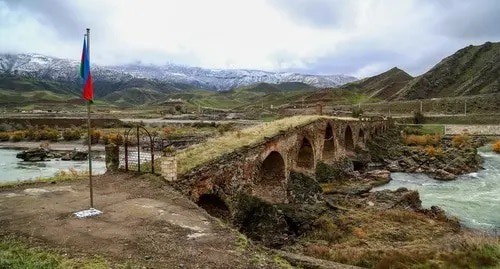 The Azerbaijani flag at the Khudaferin bridge of the Djabrail District of Nagorno-Karabakh. Photo by Aziz Karimov for the Caucasian Knot The Azerbaijani flag at the Khudaferin bridge of the Djabrail District of Nagorno-Karabakh. Photo by Aziz Karimov for the Caucasian Knot