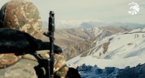 An Armenian soldier in combat position. Screenshot of the video by the press service of the Ministry of Defence of Armenia https://mil.am/hy/news/9921 An Armenian soldier in combat position. Screenshot of the video by the press service of the Ministry of Defence of Armenia https://mil.am/hy/news/9921