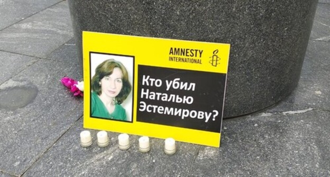 A poster and candles lit in memory of Natalia Estemirova on Lermontov Square, Moscow. July 15, 2015. Photo by Gor Alexanyan for the "Caucasian Knot" A poster and candles lit in memory of Natalia Estemirova on Lermontov Square, Moscow. July 15, 2015. Photo by Gor Alexanyan for the "Caucasian Knot"