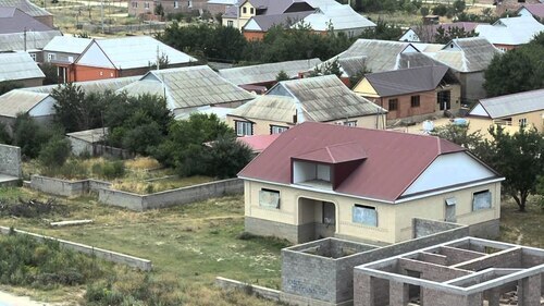 The dwelling settlement of Bammatbekyurt. Screenshot of the video by Samir Khunkerov https://www.youtube.com/watch?v=ay7taGDoi4I The dwelling settlement of Bammatbekyurt. Screenshot of the video by Samir Khunkerov https://www.youtube.com/watch?v=ay7taGDoi4I