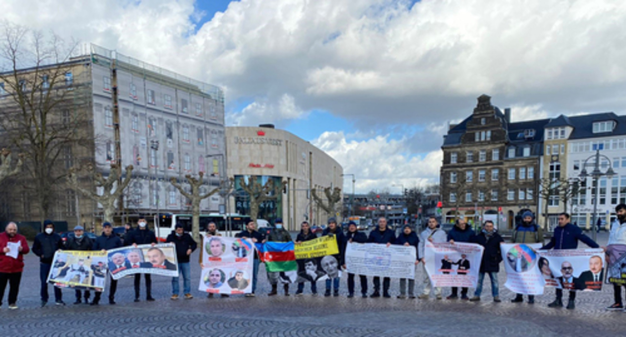 Azerbaijani migrants living in Germany at a protest action in defense of the rights of activists arrested in Baku after deportation. Photo provided by the event organizer Azerbaijani migrants living in Germany at a protest action in defense of the rights of activists arrested in Baku after deportation. Photo provided by the event organizer