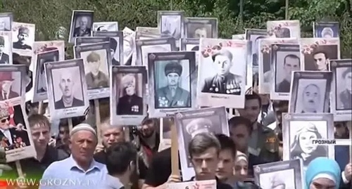 Participants in the Immortal Regiment procession in Grozny on May 9, 2019. Image made from video posted by TV channel ‘Grozny’: https://www.youtube.com/watch?v=3pjVOi_3Bjo Participants in the Immortal Regiment procession in Grozny on May 9, 2019. Image made from video posted by TV channel ‘Grozny’: https://www.youtube.com/watch?v=3pjVOi_3Bjo