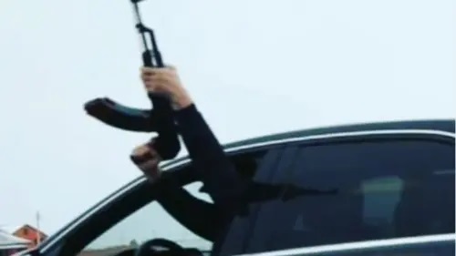 A driver with a machine gun. Photo: press service of the Ministry of Interior of Russia A driver with a machine gun. Photo: press service of the Ministry of Interior of Russia