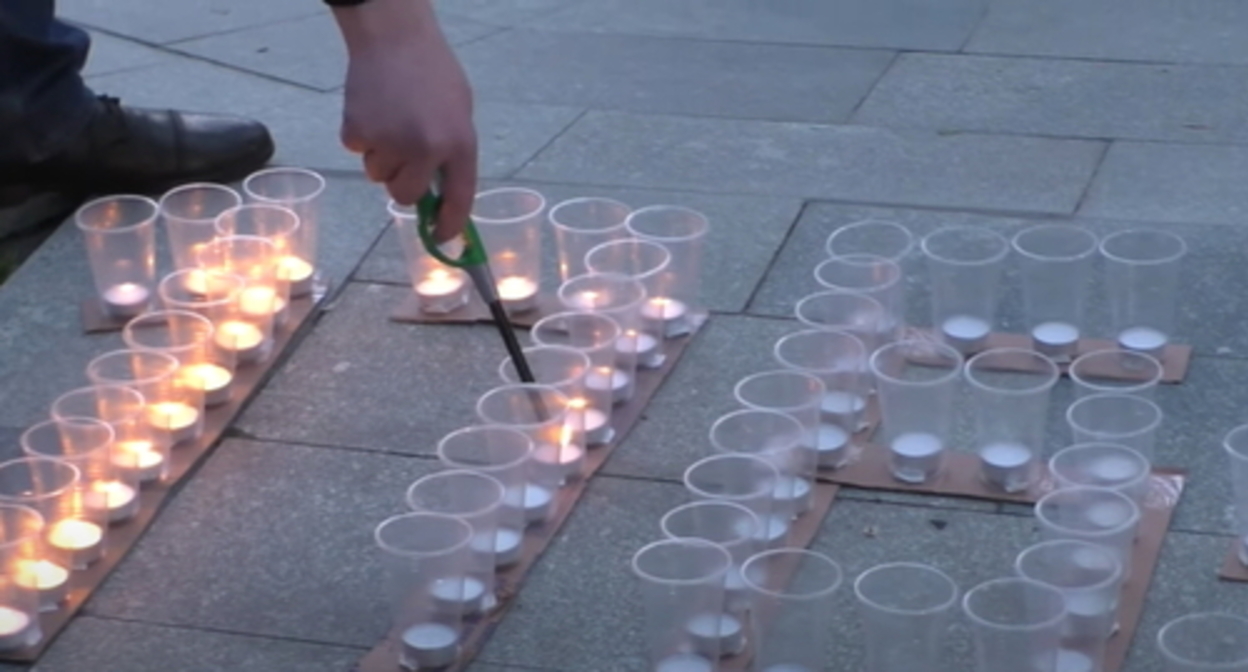 Candles lit in Nalchik in memory of the Caucasian War victims. Screenshot of the video by the "Caucasian Knot" https://www.youtube.com/watch?v=4z5rMPPC5YY Candles lit in Nalchik in memory of the Caucasian War victims. Screenshot of the video by the "Caucasian Knot" https://www.youtube.com/watch?v=4z5rMPPC5YY