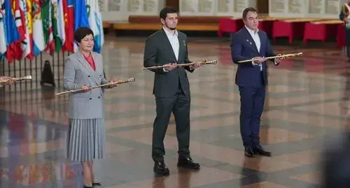 Khas-Magomed Kadyrov, the Grozny Mayor (in the center), is awarded with the commemorative "Sword of Victory." Photo: press service of the administration of Grozny https://grozmer.ru/images/photos/article3899.jpg Khas-Magomed Kadyrov, the Grozny Mayor (in the center), is awarded with the commemorative "Sword of Victory." Photo: press service of the administration of Grozny https://grozmer.ru/images/photos/article3899.jpg
