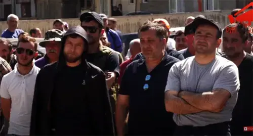 Striking “Borjomi” workers. May 2022. Screenshot of the video https://www.youtube.com/watch?v=HUkkU6HfA_k Striking “Borjomi” workers. May 2022. Screenshot of the video https://www.youtube.com/watch?v=HUkkU6HfA_k