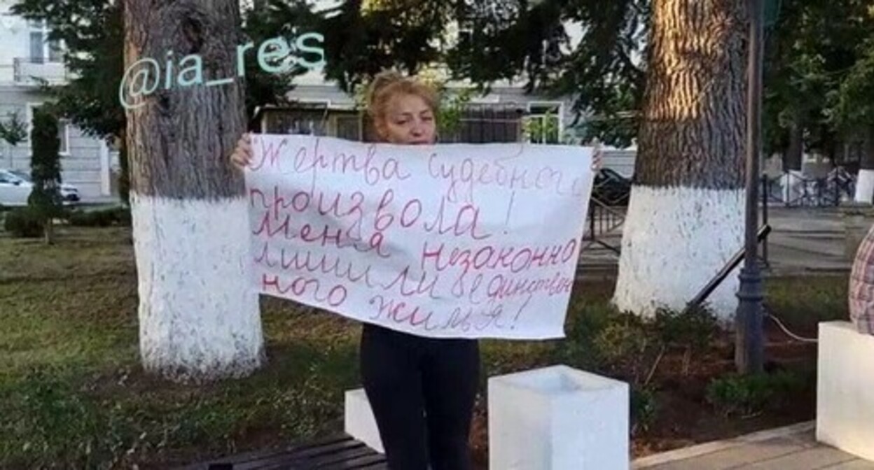 Alina Djioeva at a picket in Tskhinvali on August 9, 2022. Screenshot of the video https://t.me/ia_res/10612 Alina Djioeva at a picket in Tskhinvali on August 9, 2022. Screenshot of the video https://t.me/ia_res/10612