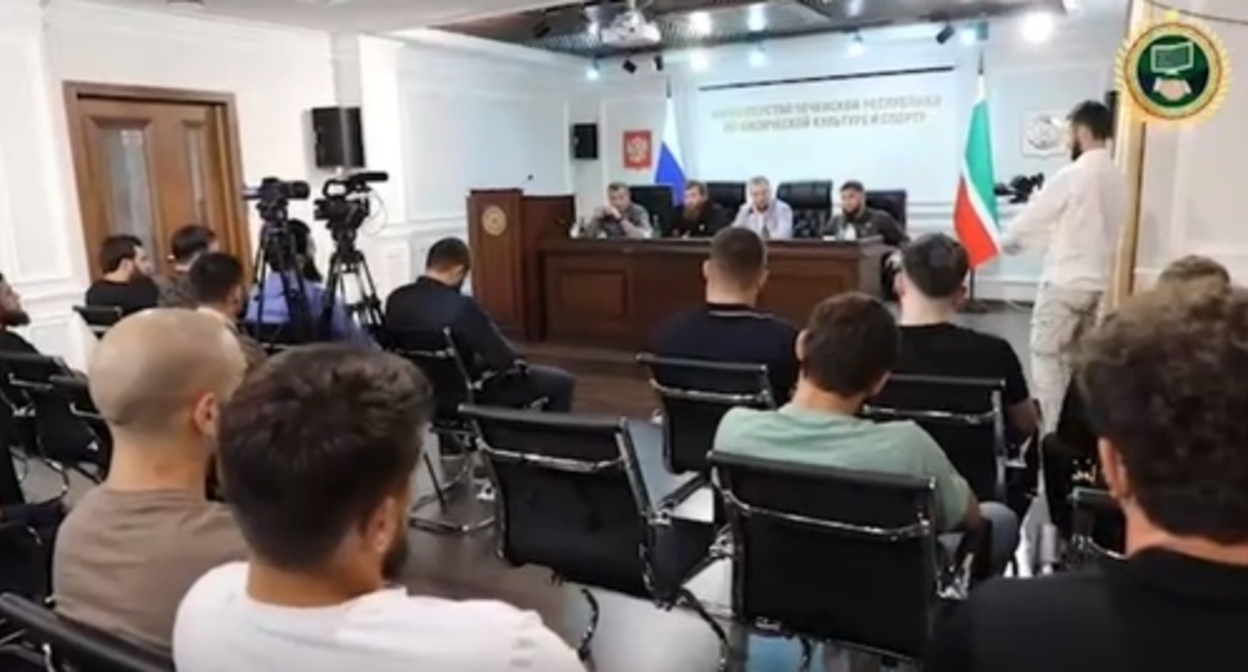 Chechen athletes at a meeting with representatives of the authorities. Image made from video posted by the Telegram channel of the Minister for National Policy of Chechnya Akhmed Dudayev https://t.me/akhmeddudaev/814 Chechen athletes at a meeting with representatives of the authorities. Image made from video posted by the Telegram channel of the Minister for National Policy of Chechnya Akhmed Dudayev https://t.me/akhmeddudaev/814