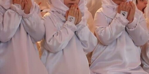 The girls are praying. Screenshot of the video posted on Ramzan Kadyrov's Telegram channel, November 12, 2022, https://t.me/RKadyrov_95/3089