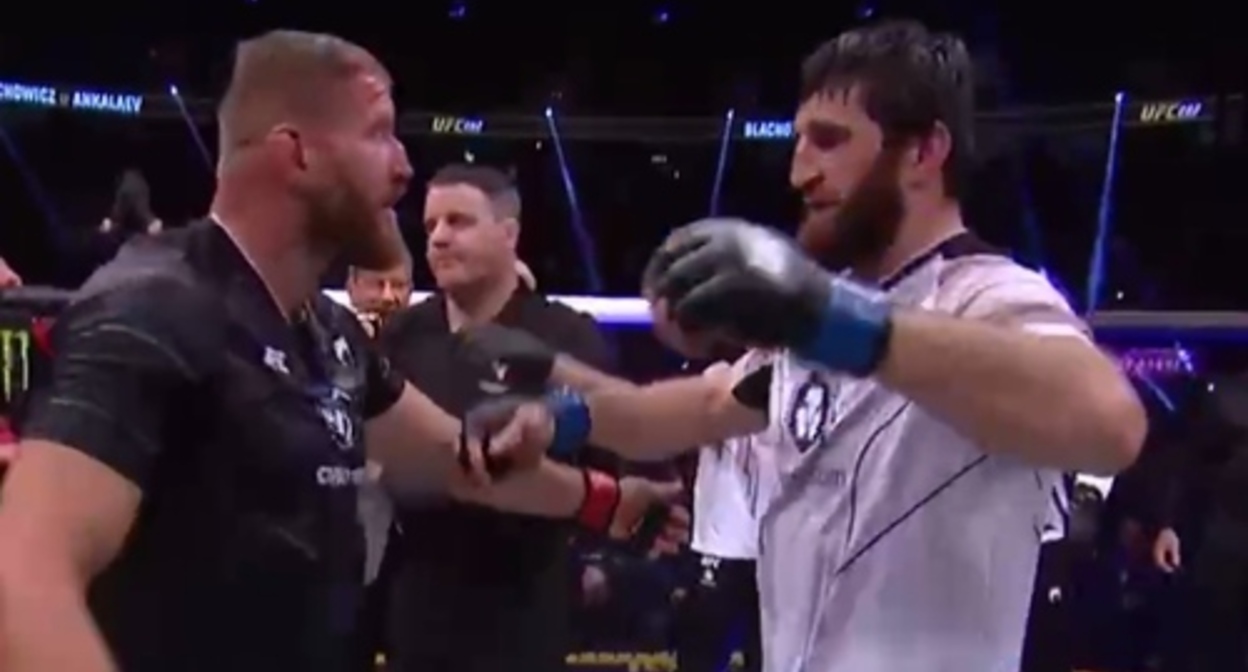 Jan Błachowicz (on the left) and Magomed Ankalaev after the fight. Screenshot of the video posted on the UFC Russia Telegram channel https://t.me/UFCRussia/5589 Jan Błachowicz (on the left) and Magomed Ankalaev after the fight. Screenshot of the video posted on the UFC Russia Telegram channel https://t.me/UFCRussia/5589