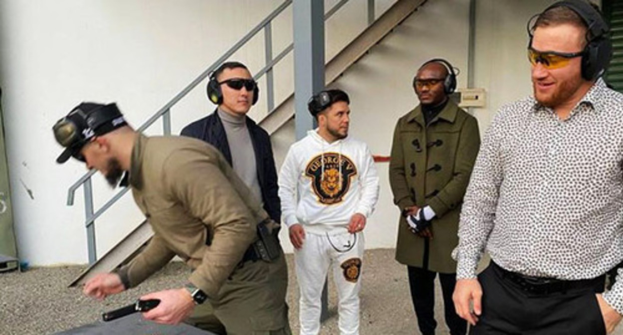 Justin Gaethje, Kamar Usman and Henry Cejudo (from left to right), the UFC fighters, at the military training ground in Chechnya, where they were allowed to fire machine guns and a grenade launcher. November 2022. Screenshot of the video by the Grozny TV channel Justin Gaethje, Kamar Usman and Henry Cejudo (from left to right), the UFC fighters, at the military training ground in Chechnya, where they were allowed to fire machine guns and a grenade launcher. November 2022. Screenshot of the video by the Grozny TV channel