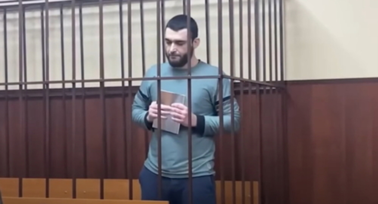 Abdulmumin Gadjiev. Screenshot of the video from the YouTube channel ROMB https://www.youtube.com/watch?v=0jex6a8-VIg Abdulmumin Gadjiev. Screenshot of the video from the YouTube channel ROMB https://www.youtube.com/watch?v=0jex6a8-VIg