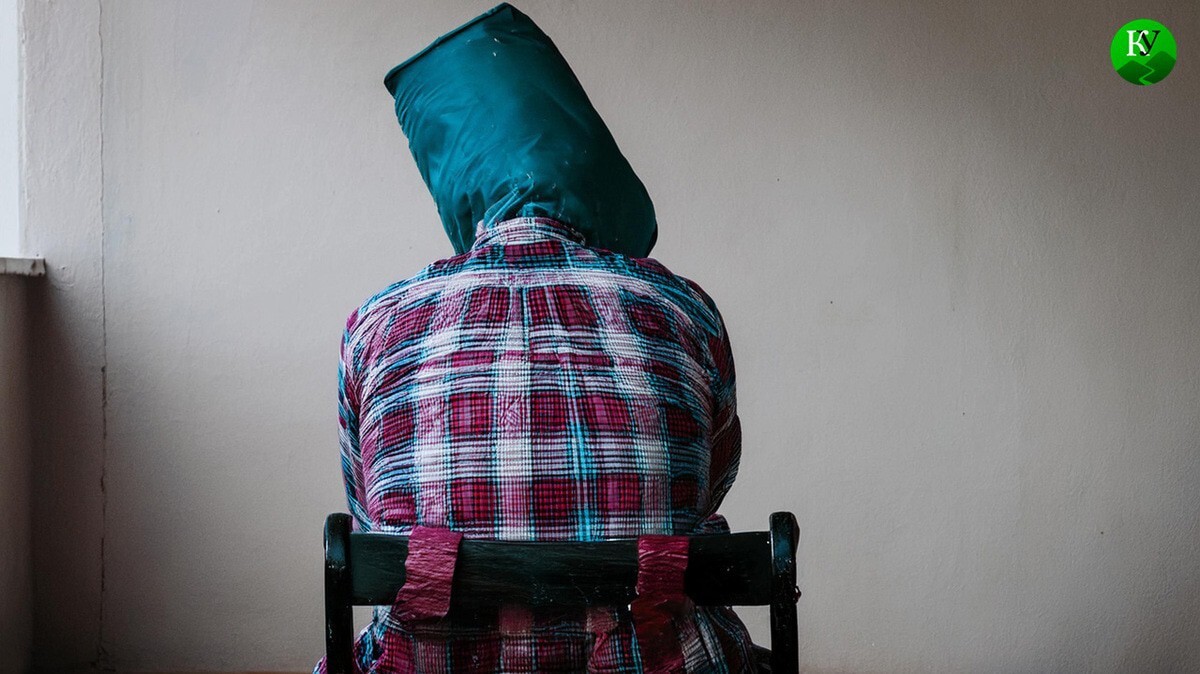 Torturing a detainee. Picture made in Photoshop by the "Caucasian Knot"