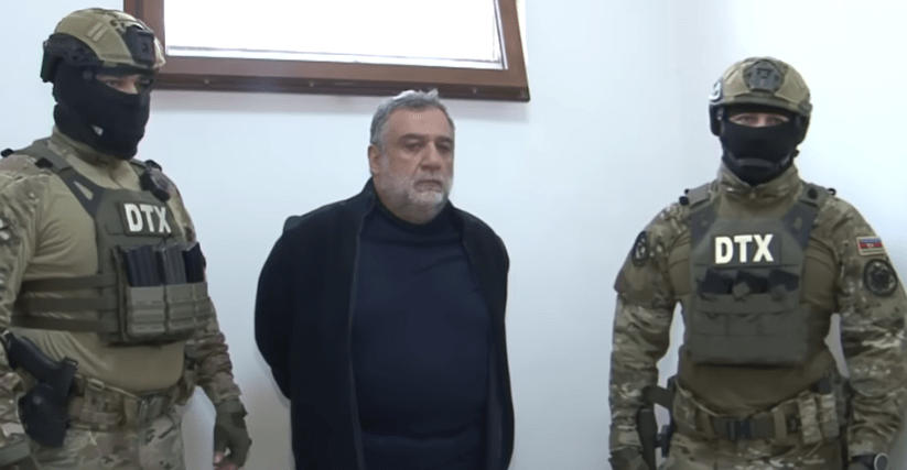 Ruben Vardanyan with the Azerbaijani law enforcers. Screenshot of a video posted by Baku TV on September 28, 2023 https://www.youtube.com/watch?v=jCumNjZ4FAw