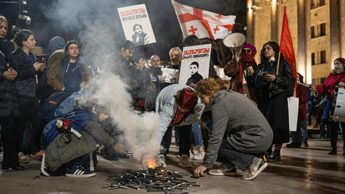 The participants of the women's march burned the bars at the Georgian Parliament. Screenshot of a photo taken by Mindia Gabadze for Publika on March 8, 2025 https://www.facebook.com/photo?fbid=1389788649087348&amp;set=pcb.1389788782420668 the activities of the Meta Company, owning Facebook, are banned in Russia 