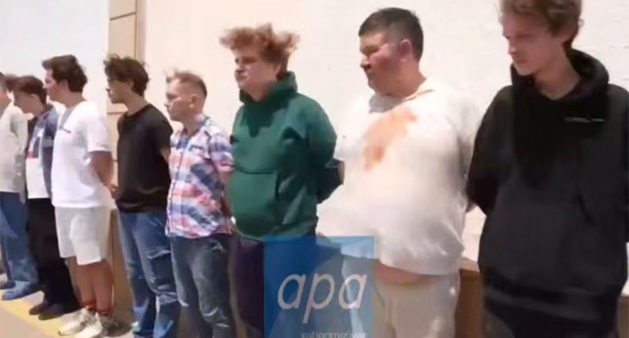 Still from a video of Russians detained in Azerbaijan. July 1, 2025. Screenshot of the video https://t.me/apa_az/100157