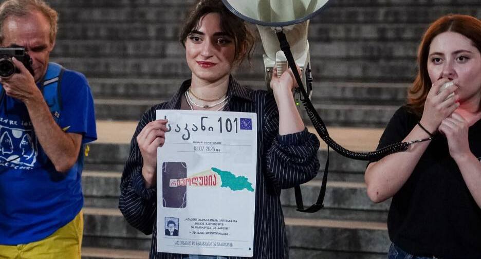 Activists at the parliament with Zviad Tsetskhladze's prison newspaper. Photo: NEWS.On.ge
