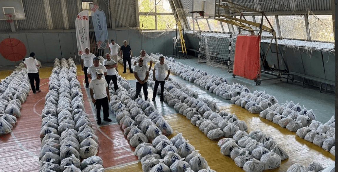 Packages with humanitarian aid. Screenshot of the photo by ANO "Eurasia" from 22.08.25, https://t.me/EurasiaNpo/6002