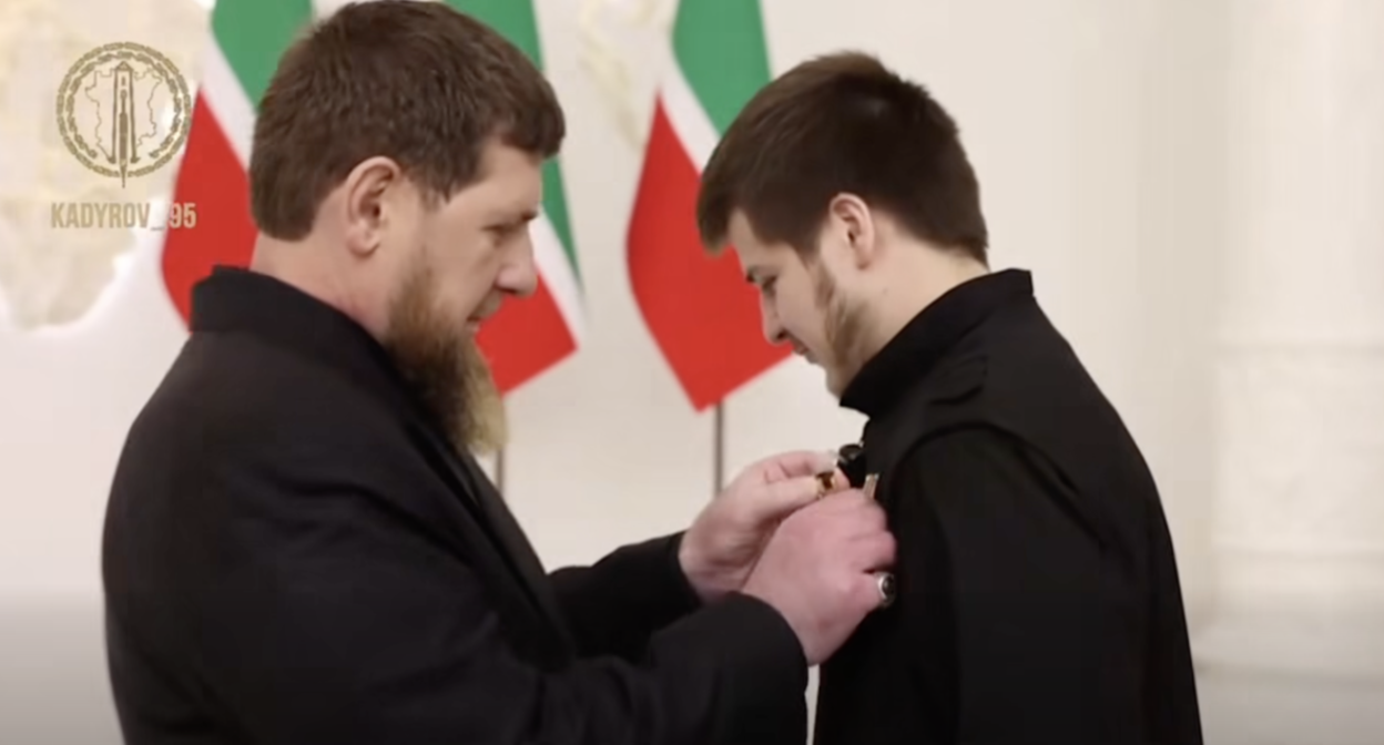 Ramzan Kadyrov presents a medal to Adam Kadyrov. Still image: https://t.me/RKadyrov_95