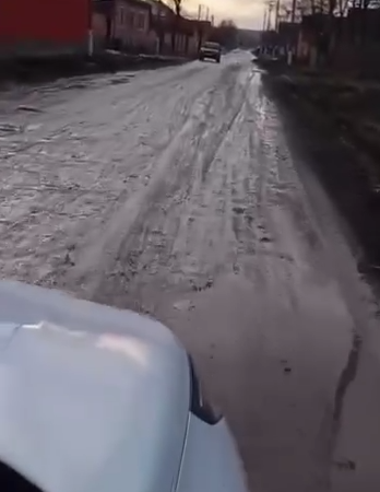 Video still from residents of Verkhnie Achaluki village, Malgobek district, about the road condition on Sheripova Street. Photo: The Magas Times / Telegram channel