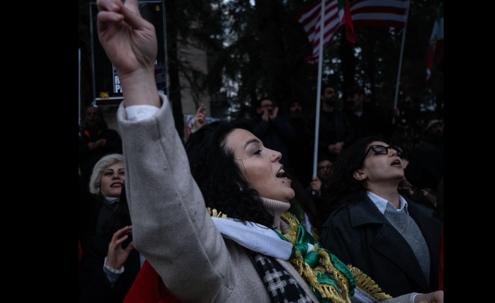 Protesters at the Iranian Embassy. Screenshot from Publika's photo from March 1, 2026, https://www.facebook.com/photo?fbid=1694962798569930&set=pcb.1694962868569923