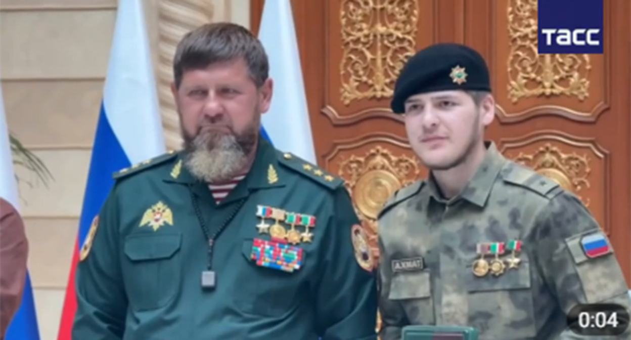 Ramzan Kadyrov (left) and Adam Kadyrov during an awards ceremony. June 12, 2026. Screenshot from video https://t.me/kavkaz_tass/40800