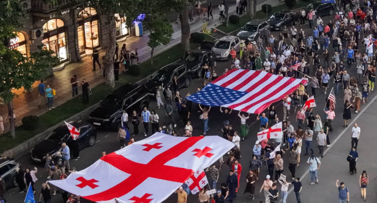 Participants of the march in Tbilisi. Screenshot of photo Mo Se from 04.07.26, https://www.facebook.com/photo?fbid=4360891467558925&set=pcb.4360892304225508