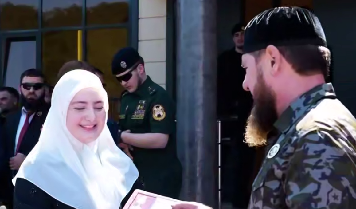 Ramzan Kadyrov awards his daughter with a medal. Frame from the video dated 21.08.26, https://t.me/MDaudov_95/3175 Ramzan Kadyrov awards his daughter with a medal. Frame from the video dated 21.08.26, https://t.me/MDaudov_95/3175